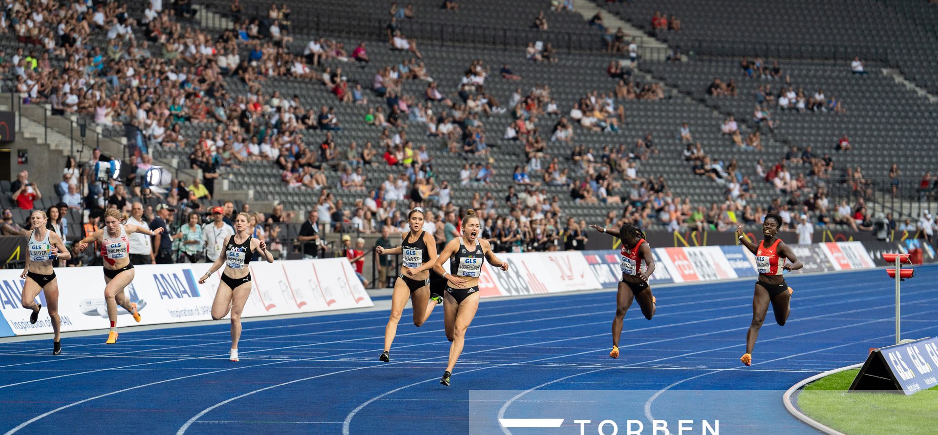 100m Finale v.l.n.r.: Sina Mayer (LAZ Zweibruecken), Talea Prepens (TV Cloppenburg), Lisa Nippgen (MTG Mannheim), Rebekka Haase (Sprintteam Wetzlar), Gina Lueckenkemper (SCC Berlin), Yasmin Kwadwo (LC Paderborn) und Keshia Beverly Kwadwo (LC Paderborn) waehrend der deutschen Leichtathletik-Meisterschaften im Olympiastadion am 25.06.2022 in Berlin